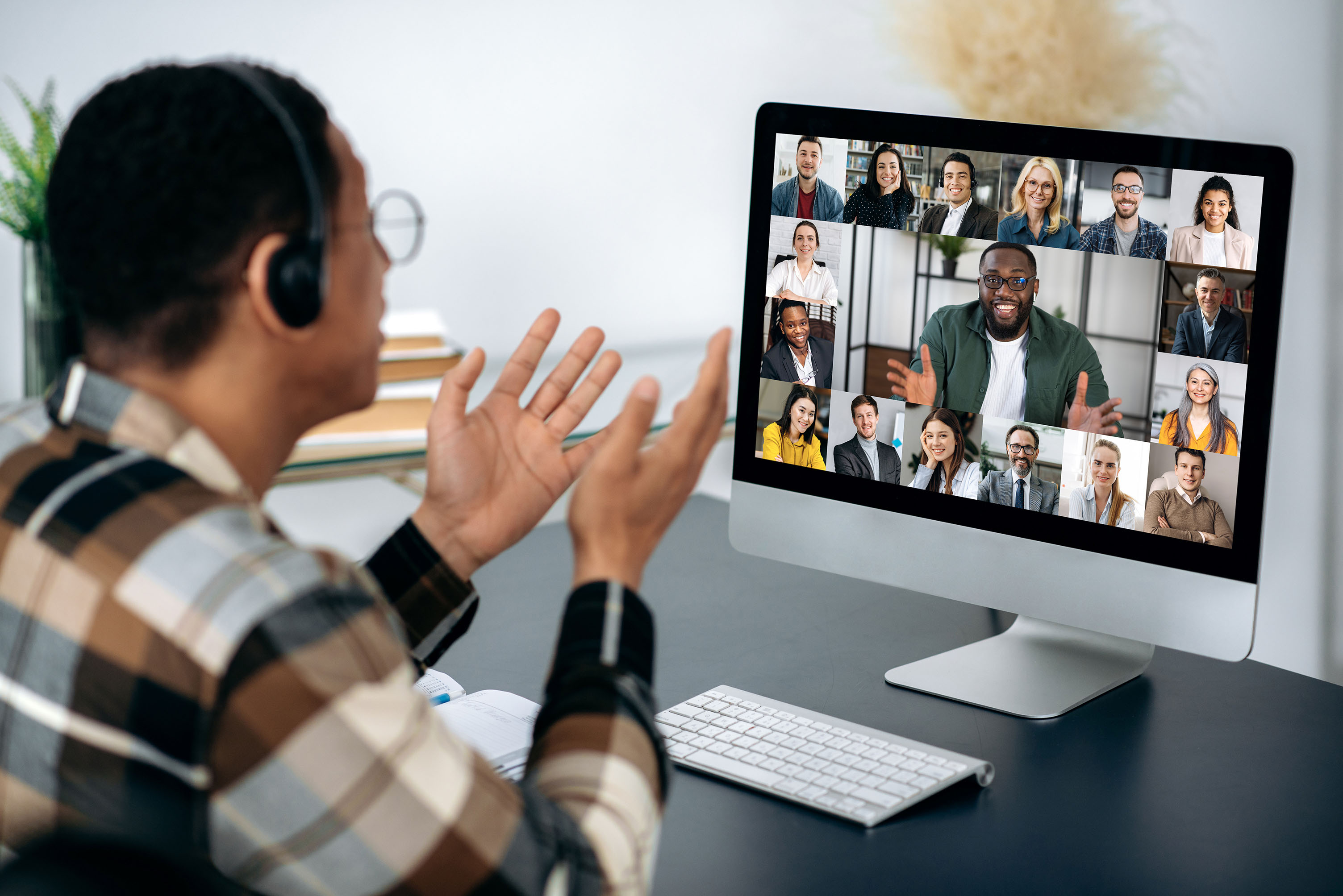 Man talking into a virtual meeting