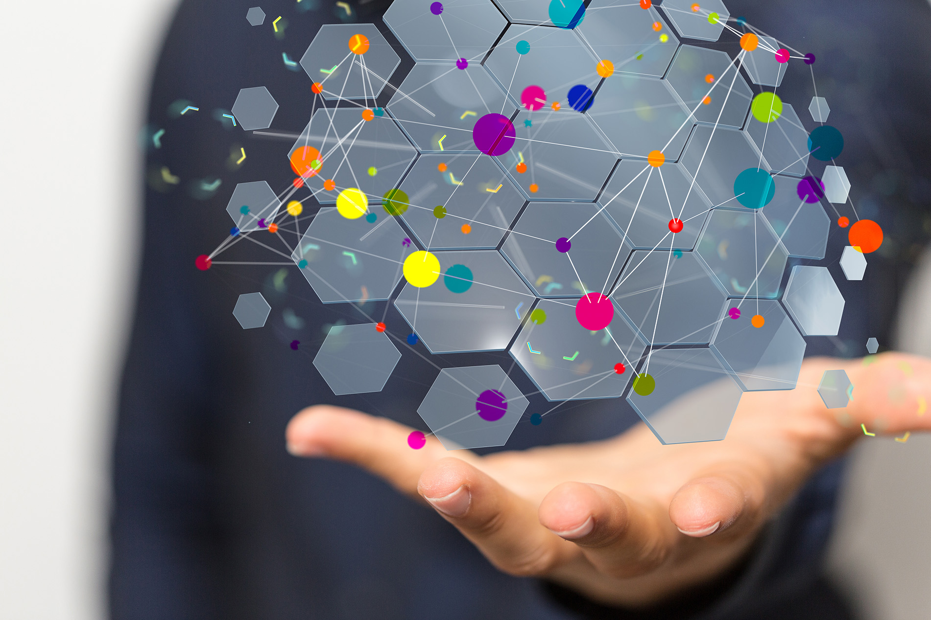 Hand with a microservices diagram